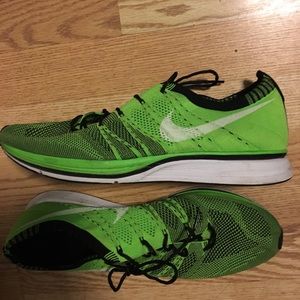 Neon green Nike Flyknit shoes